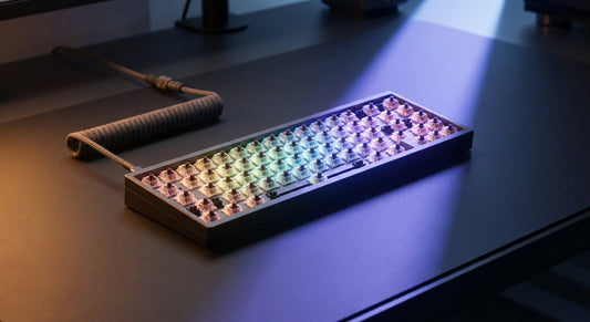 A mechanical keyboard dramatically lit with split warm and cool lighting on a dark desk, symbolizing the contrast between wired and wireless connectivity.