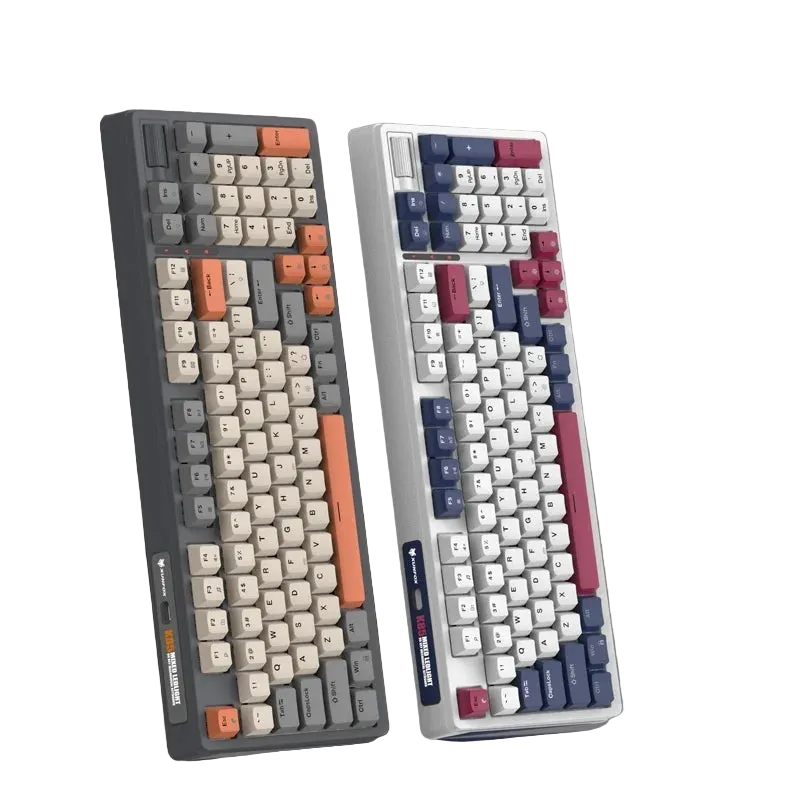 Two mechanical keyboards in gray and silver, featuring colorful keycaps and ergonomic design.
